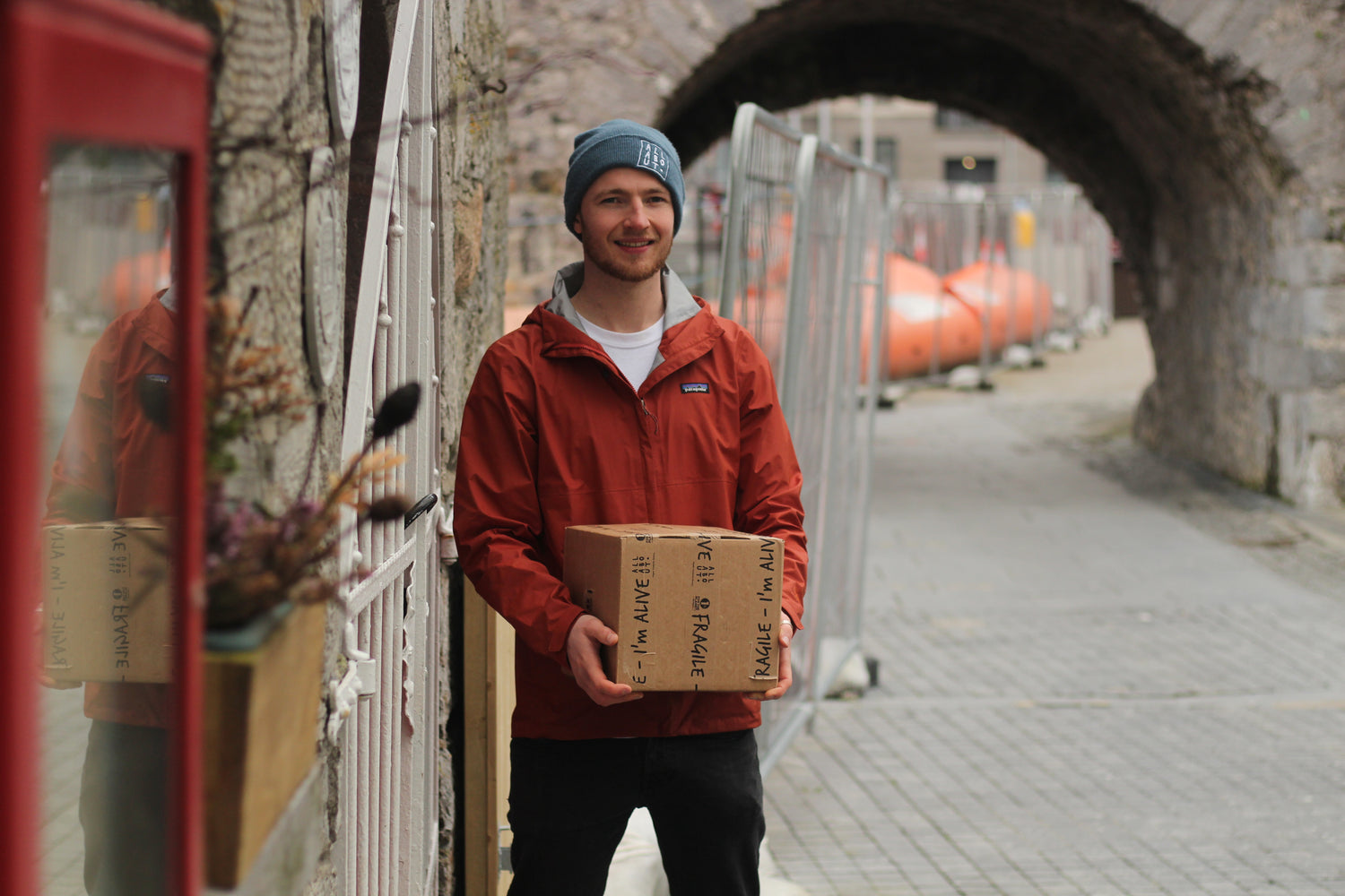 All About Kombucha Co-Founder Keith Loftus with bottled fermented tea for nationwide delivery in Ireland